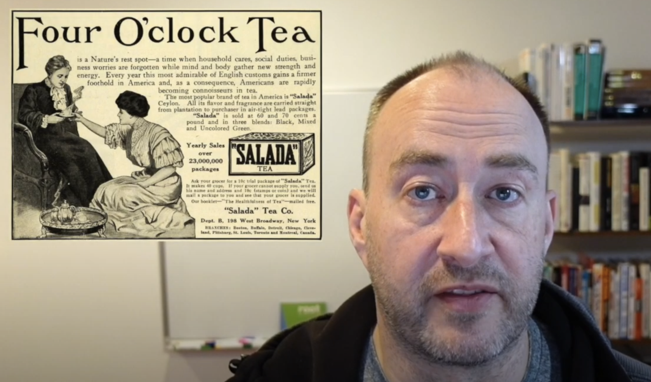 Alistair in front of an old newspaper image advertising tea